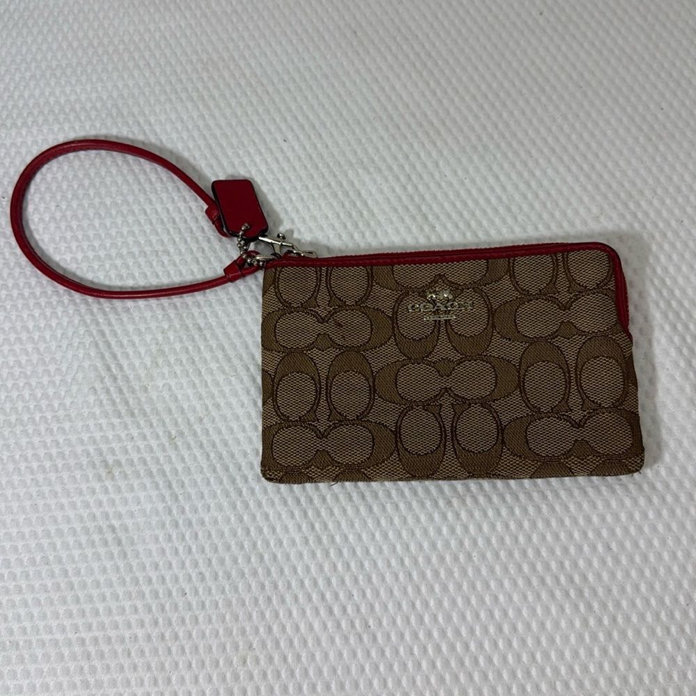 Coach tan and red Wristlet with Logo Pattern